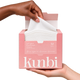 Kunbi Soft Serve Face Towels 50-pack held open by hand — real product photograph